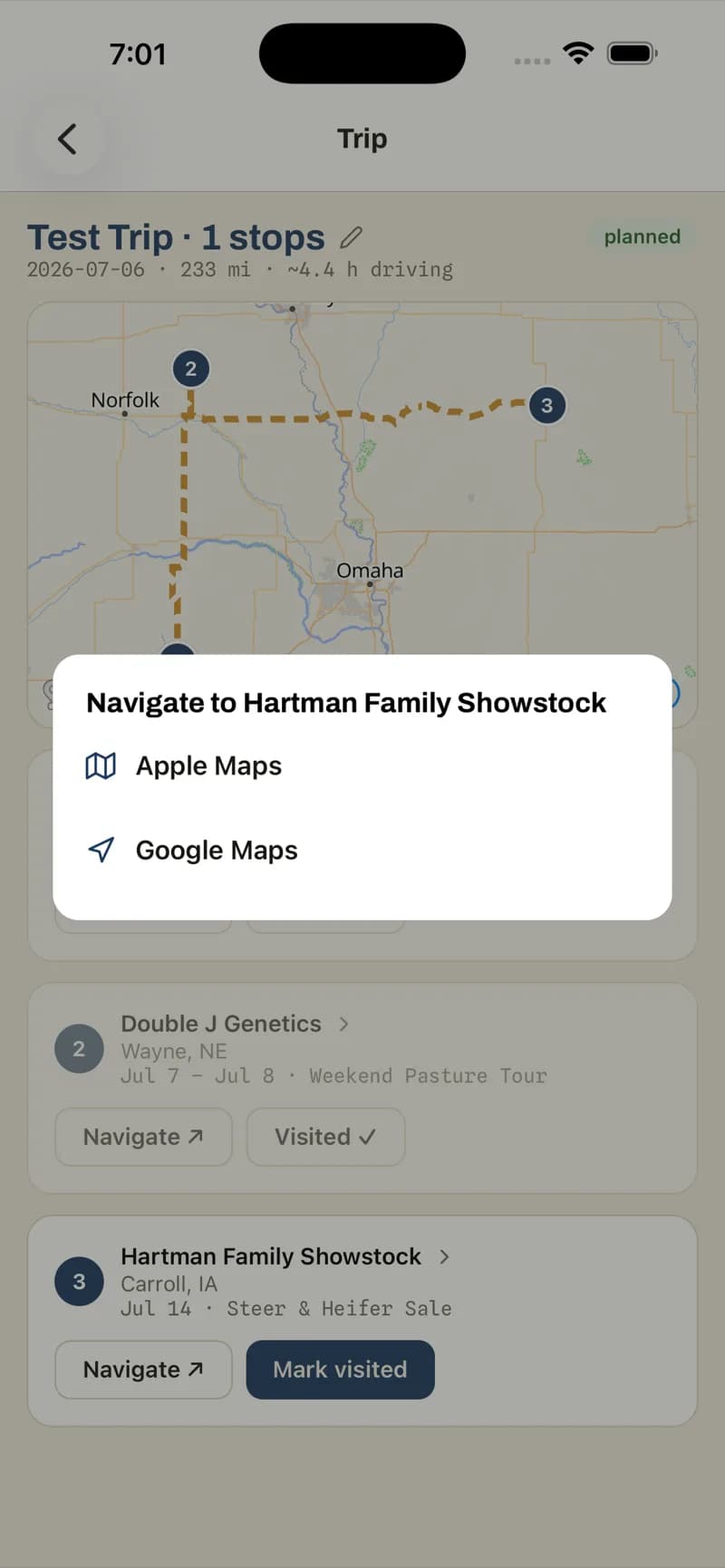 A ShowNav navigate hand-off sheet offering to open the sale location in Apple Maps or Google Maps.